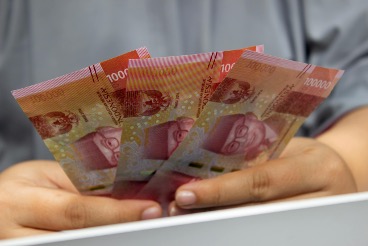 Rupiah Melemah Imbas Ketegangan Donald Trump dan The Fed